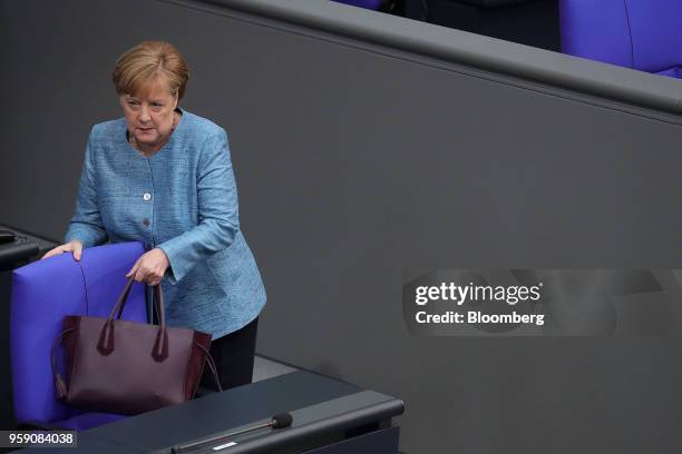 Angela Merkel, Germany's chancellor, arrives for a budget policy plan debate in the lower-house of the Bundestag in Berlin, Germany, on Wednesday,...