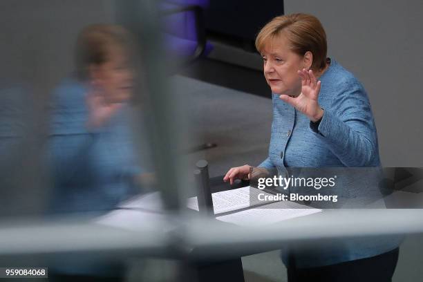 Angela Merkel, Germany's chancellor, gestures while speaking during a budget policy plan debate in the lower-house of the Bundestag in Berlin,...