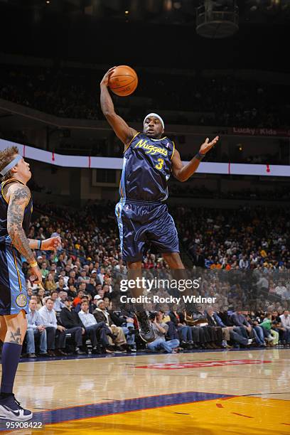 Ty Lawson of the Denver Nuggets grabs a rebound against the Golden State Warriors on January 20, 2010 at Oracle Arena in Oakland, California. NOTE TO...