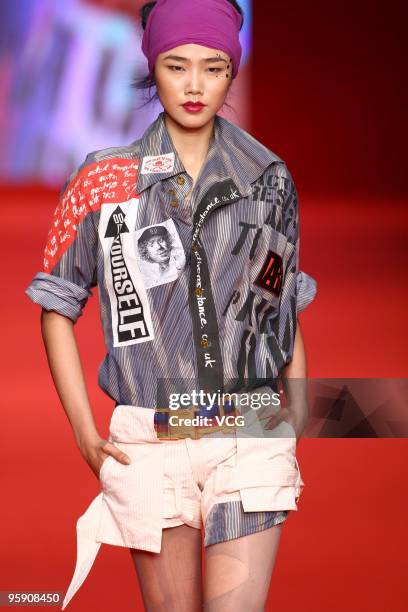 Model showcases designs by Andreas Kronthaler during the Vivienne Westwood Spring-Summer 2010 collection on the catwalk during the Hong Kong Fashion...