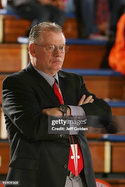 Head coach Max Good of the Loyola Marymount Lions looks on during warmups before the men's college basketball game against the Pepperdine Waves on...