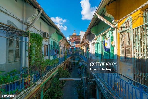 living space in ancient old housing estate at cho lon, china town ho chi minh city saigon. - district 5 ho chi minh city stock pictures, royalty-free photos & images