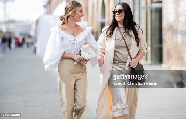 Guests wearing beige colors during Mercedes-Benz Fashion Week Resort 19 Collections at Carriageworks on May 16, 2018 in Sydney, Australia.