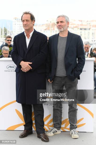 Actor Vincent Lindon and director Stephane Brize attends "In War " Photocall during the 71st annual Cannes Film Festival at Palais des Festivals on...