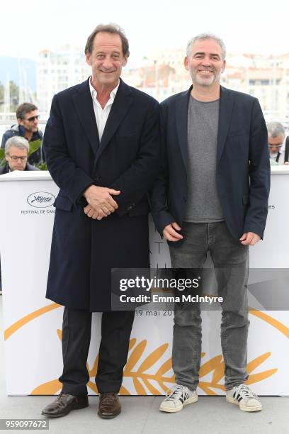 Actor Vincent Lindon and director Stephane Brize attends "In War " Photocall during the 71st annual Cannes Film Festival at Palais des Festivals on...