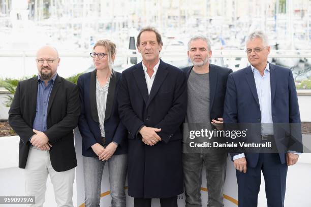 Olivier Lemaire, Melanie Rover, Vincent Lindon, Stephane Brize and Jean Grosset attend the photocall for the "In War " during the 71st annual Cannes...