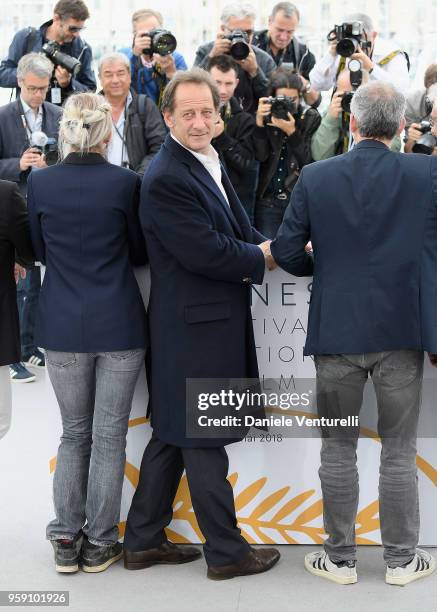 Melanie Rover, Vincent Lindon and Stephane Brize attend the photocall for the "In War " during the 71st annual Cannes Film Festival at Palais des...