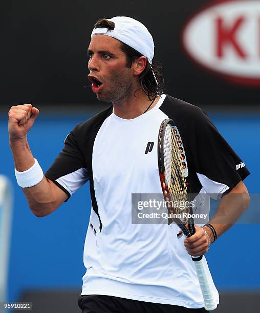 Albert Montanes of Spain celebrates winning a point in his second round match against Stephane Robert of France during day four of the 2010...