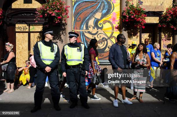 Police officers keep watch on the second and final day of the 2016 Notting Hill Carnival in west Londonby some accounts the 50th anniversary of the...