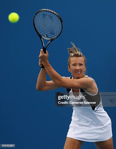 Kveta Peschke of the Czech Republic plays a backhand in her first round doubles match with Chia-Jung Chuang of Chinese Taipei against Ipek Senoglu of...