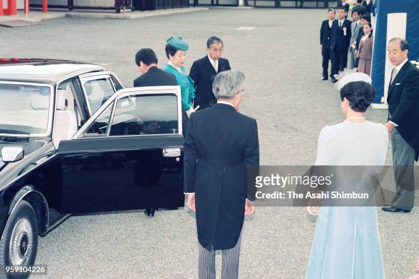 Prince Mikasa and Princess Yuriko of Mikasa are welcomed by Prince Hitachi and Princess Hanako of Hitachi are seen on arrival at a tea party hosted...