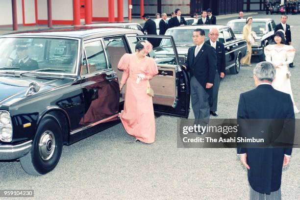 Empress Michiko is seen on arrival at a tea party hosted by Imperial Household Agency after visiting the Mausoleum of Emperor Komei to report Emperor...