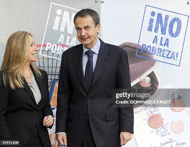 Spain's Prime Minister Jose Luis- Rodriguez Zapatero chats with Spanish Minister for Health and Social Policy Trinidad Jimenez-Garcia-Herrera before...