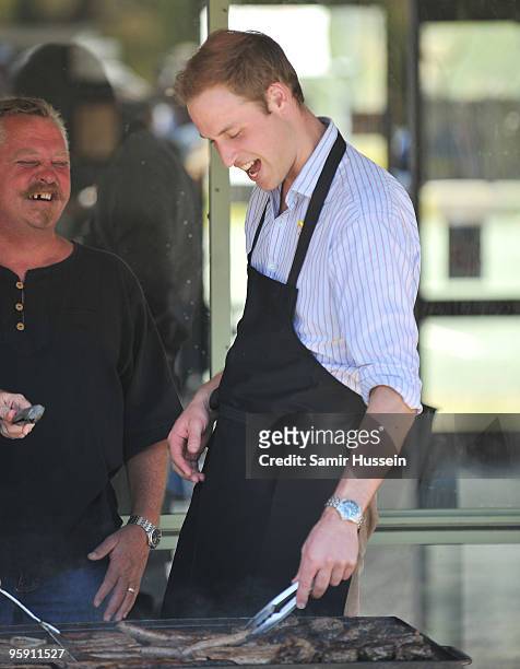 Prince William helps out wiht a BBQ at the Flowerdale community event on the third and final day of his unofficial visit to Australia on January 21,...