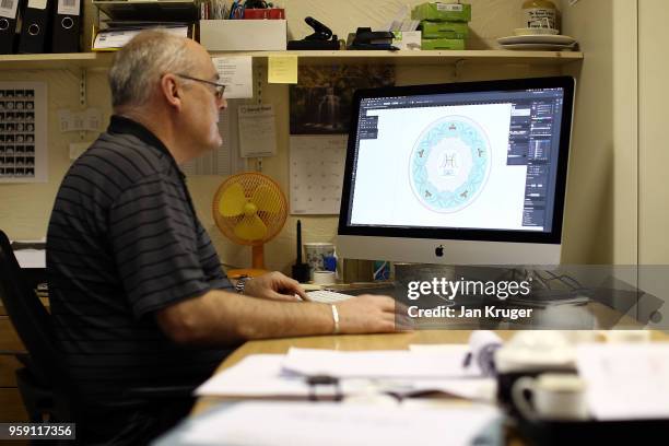 Designer Greg Henshaw inspects the special edition design ahead of the wedding of Prince Harry and Meghan Markle at William Edwards Home Ltd on May...