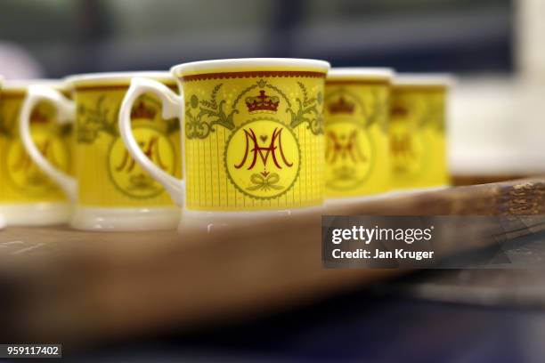 Cups are prepared as part of a special collection ahead of the wedding of Prince Harry and Meghan Markle at William Edwards Home Ltd on May 16, 2018...
