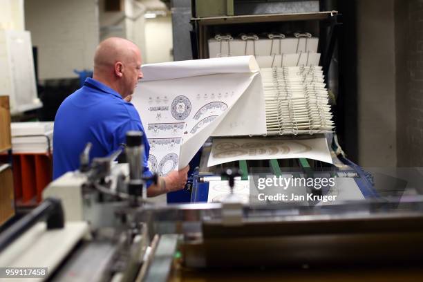 Ian Williams oversees the print work for the production of special edition crockery ahead of the wedding of Prince Harry and Meghan Markle at William...