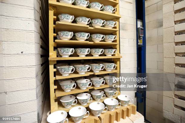 Baked tea cups for the production of special edition crockery ahead of the wedding of Prince Harry and Meghan Markle at William Edwards Home Ltd on...
