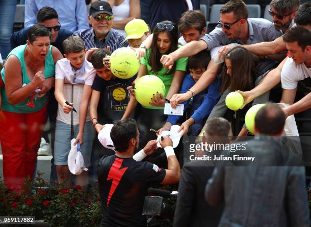 Fabio Fognini of Italy signs autographs after his win over Dominic Thiem of Austria during day four of the Internazionali BNL d'Italia 2018 tennis at...