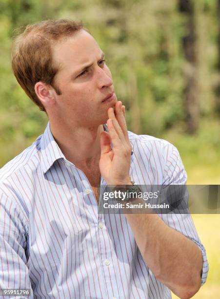 Prince William speaks to members of a family who lost their home to the bushfires of 2009 on the third and final day of his unofficial visit to...