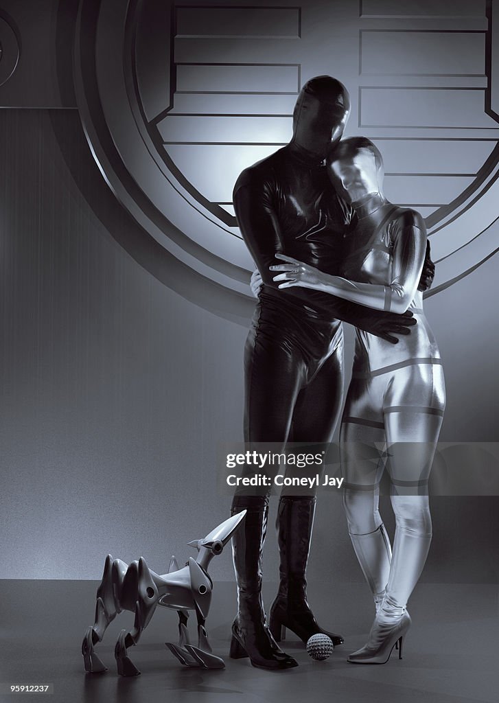 Happy futuristic couple and robot dog