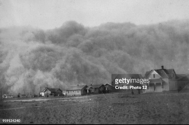 Photograph of a dust storm approaching Stratford, Texas. Dated 1935.