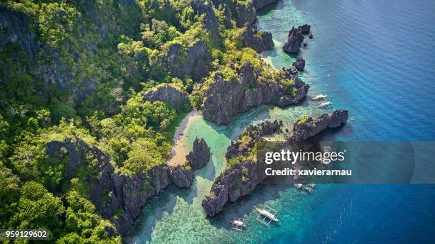 aerial view of hidden beach, el nido, palawan, philippines - el nido stock pictures, royalty-free photos & images