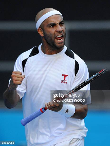 Tennis player James Blake gestures during his men's singles match against Argentinia opponent Juan Martin Del Potro on the third day of play at the...