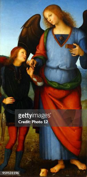 Detail from the painting titled 'The Virgin and Child with an Angel, the Archangel Raphael with Tobias and the Archangel Michael' by Pietro Perugino...