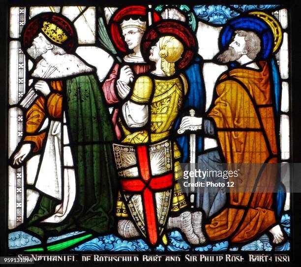 Stained glass window at St Michael and All Angels Anglican church, in Hughenden, Buckinghamshire, England. The window depicts crusader kings and...