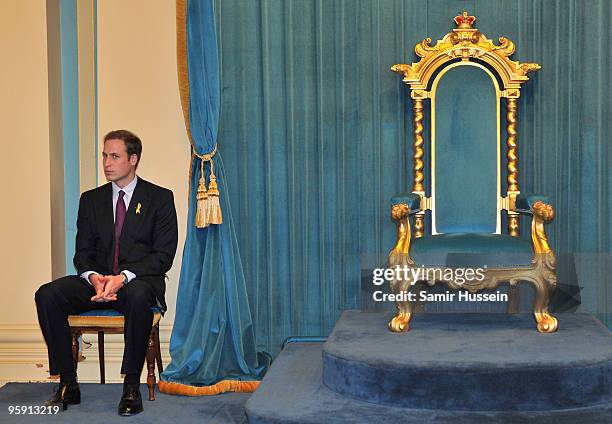Prince William sits next to an empty throne chair at Government House on the third and final day of his unofficial visit to Australia on January 21,...