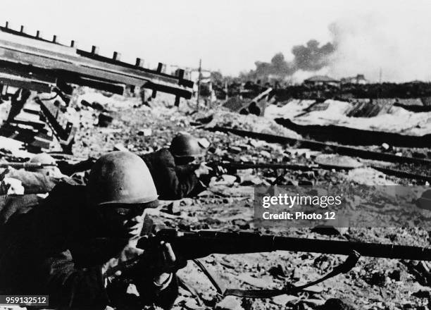 October 1942, Stalingrad, Russia; Streetfight in front of Red October a company area.