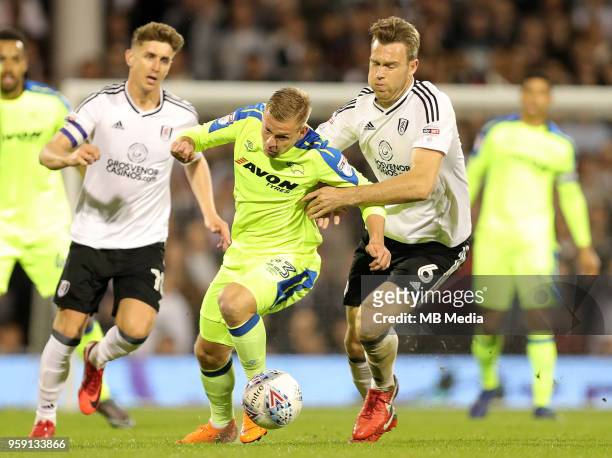 Matej Vydra of Derby County is brought down by Fulham's Kevin McDonald during the Sky Bet Championship Play Off Semi Final Second Leg on May 14, 2018...