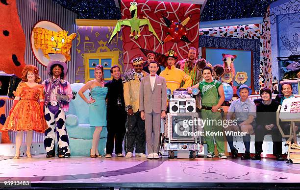 Actor Paul Reubens poses onstage with cast and producers at the opening night of "The Pee-wee Herman Show" in Club Nokia at L.A. Live on January 20,...