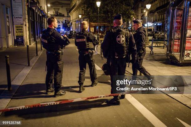 Police forces deployed after the knife attack at Monsigny street and Saint Augustin street, on May 12, 2018 in Paris, France. There would be 1 dead...