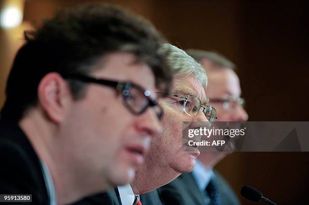 Stefan Weinmann Director Communications of Opel, Nick Reilly CEO of Opel, and Reinald Hoben, Vice-president of GM Europe, listen to questions during...