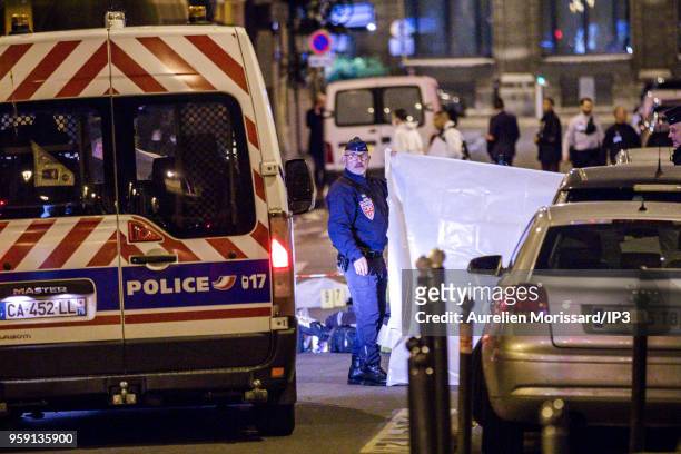 Police forces deployed after the knife attack at Monsigny street and Saint Augustin street, on May 12, 2018 in Paris, France. There would be 1 dead...