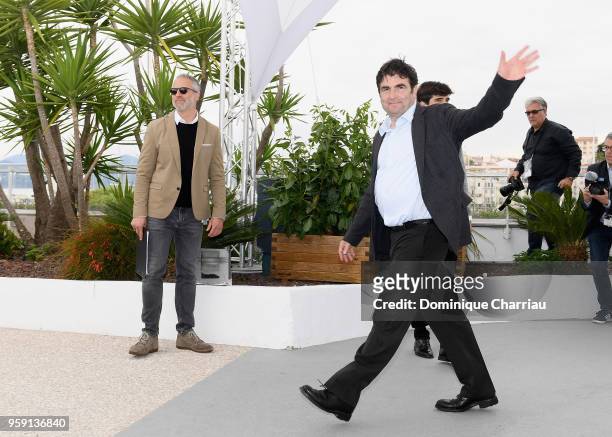French director Romain Goupil waves goodbye at the "La Traversee" Photocall during the 71st annual Cannes Film Festival at Palais des Festivals on...
