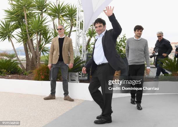 French director Romain Goupil waves goodbye at the "La Traversee" Photocall during the 71st annual Cannes Film Festival at Palais des Festivals on...