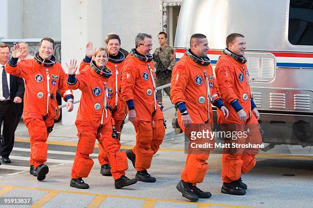 Space Shuttle Endeavour astronauts mission specialists Nicholas Patrick, Kathryn Hire, Robert Behnken, and Stephen Robinson, Commander George Zamka...