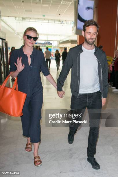 Model Lara Stone and David Grievson are seen during the 71st annual Cannes Film Festival at Nice Airport on May 16, 2018 in Nice, France.