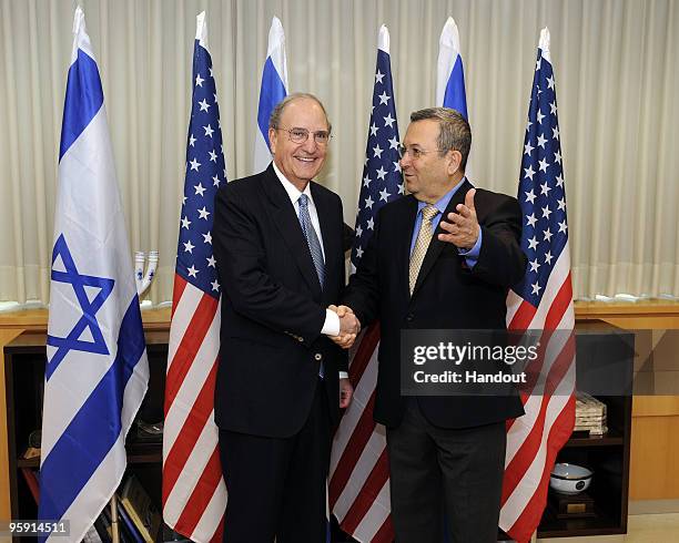 In this handout image supplied by the U.S. Embassy in Tel Aviv, Special envoy to the Middle East for the Obama administration George Mitchell meets...