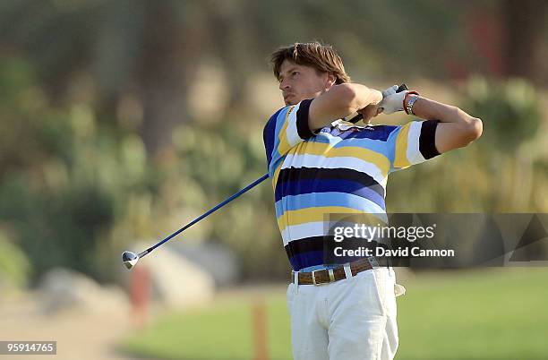 Robert-Jan Derksen ofTthe Netherlands plays his second shot at the par 5, 18th hole during the first round of The Abu Dhabi Golf Championship at Abu...