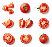 Set of fresh whole and sliced tomatoes