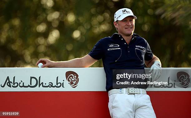 Jamie Donaldson of Wales waits to tee off on the ninth hole during the first round of The Abu Dhabi Golf Championship at Abu Dhabi Golf Club on...