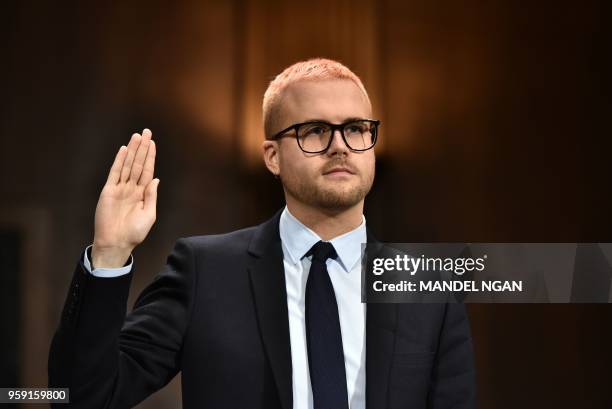 Cambridge Analytica former employee and whistleblower Christopher Wylie is sworn in before he testifies at the Senate Judiciary Committee on...