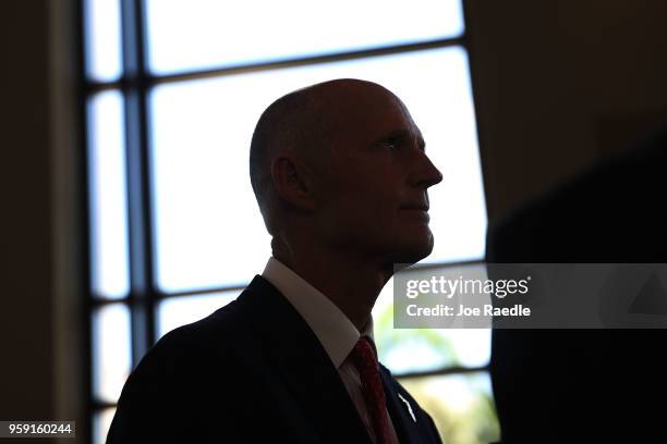 Florida Governor Rick Scott speaks to the media as he attends the Governor's Hurricane Conference at Palm Beach County Convention Center on May 16,...