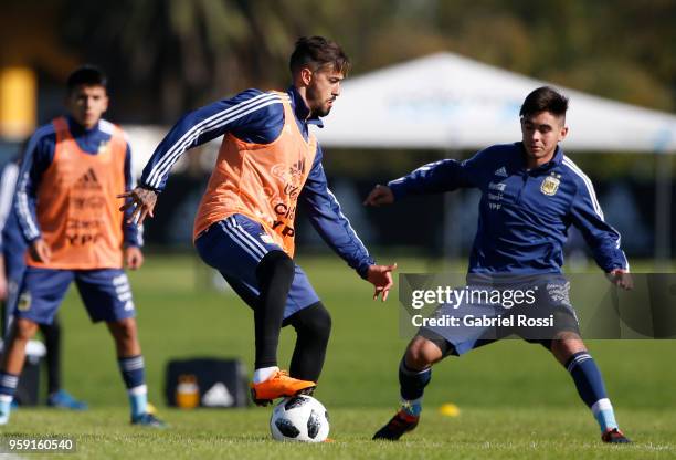 Manuel Lanzini of Argentina fights for the ball with a sparring during a traning session as part of the preparation for the FIFA World Cup Russia at...