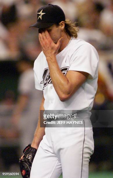 Randy Johnson of the Houston Astros walks off the mound 29 September after giving up a home run in the eighth inning to Greg Vaughn of the San Diego...