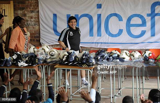 Argentinian football head coach Diego Maradona visits the Selekelela Secondary School on January 21, 2010 in Soweto on the fourth day of his five day...